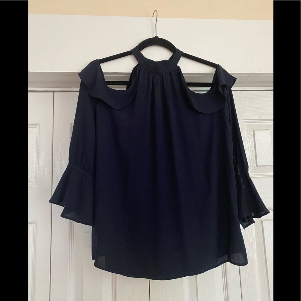 Shoulder reveal navy blue blouse